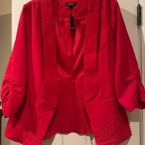 New, with tag.  Salsa Blazer from Torrid.  Size 1.